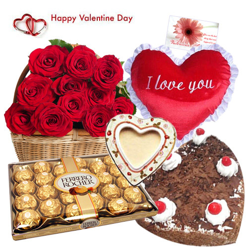 Lovely Valentine Surprise - 25 Red Roses Basket + Black Forest Heart Cake 1 kg + Photo Frame + Heart Shape Pillow + Ferrero Rocher 24 Pcs + Card