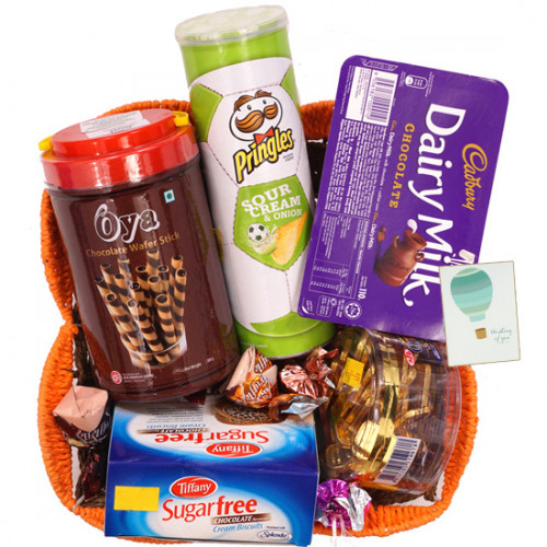 Sweet Gift Basket -  Sugarfree Cookies, Oya Chocolate Wafer Stick, Pringles Wafers, Dairy Milk Chocolates Pack, Swiss Gold Coin Box, Handmade Chocolates, Truffles Toffee & Card