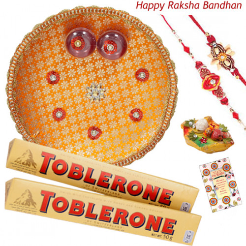 Wonder Combo Thali - Puja Thali (O), Toblerone 2 pcs with 2 Fancy Rakhis and Roli-Chawal