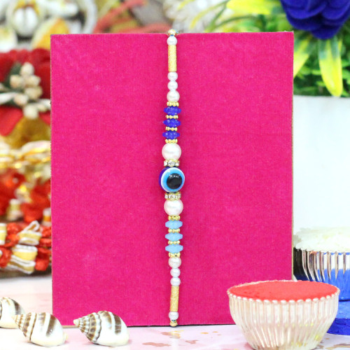 Simple & Sober Evil Eye Rakhi with Beadwork