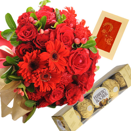 Exotic Combination - 12 Red Roses & 6 Gerberas in Basket + Ferrero Rocher 4 pcs + Card
