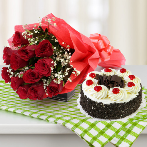 Alluring Flowers & Cake - 10 Red Roses, 1/2 Kg Black Forest Cake+ Card
