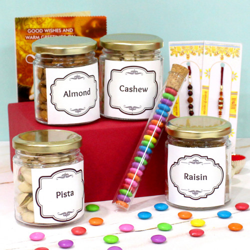 Dryfruit Jar - Almond in Jar, Cashew in Jar, Pista in Jar, Raisin in Jar, Gems in Glass Tube, 2 Rakhi, Free Greeting Card & Roli-Chawal