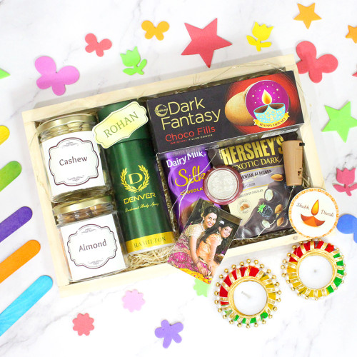 Impressive Diwali Gift - Almond in Jar, Cashew in Jar, Denver Deo, Hershey's Exotic Dark, Dark Fantasy Cookies, Dairy Milk Silk, Led Light, 3 Diwali Props, Wooden Tray with 2 Designer Diyas and Laxmi-Ganesha Coin