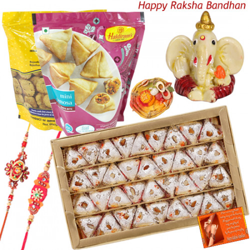 Sweets for Bro - Kaju Pan, 2 Haldiram Namkeen, Ganesh Idol with 2 Rakhi and Roli-Chawal