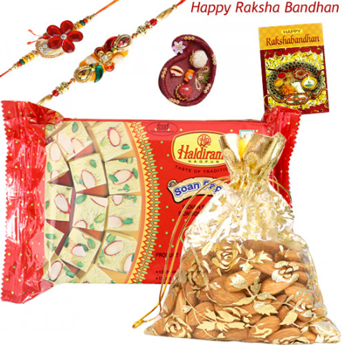 Almondy Papdi - Haldiram Soan Papdi 500 gms, Almonds 100 gms in Potli with 2 Rakhi and Roli-Chawal