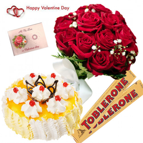 Red Toblerone Cake - Bunch Of 10 Red Roses, 2 Toblerone 100 Gms Each, 1/2 Kg Pineapple Cake & Valentine Greeting Card