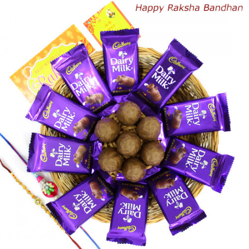Basket Full of Love - 10 Dairy Milk, Hand Made Chocolates 100 gms, Basket with 2 Rakhi and Roli-Chawal