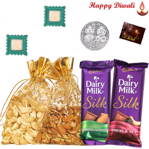 Badam & Kaju Potli - Almond & Cashew 400 gms in Potli, 2 Dairy Milk Silk with 2 Diyas and Laxmi-Ganesha Coin