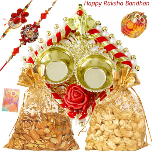 Kaju & Badam Thali - Almond 100 gms in Potli & Cashew 100 gms in Potli, Auspicious Ganesha Thali with Pearls with 2 Rakhi and Roli-Chawal