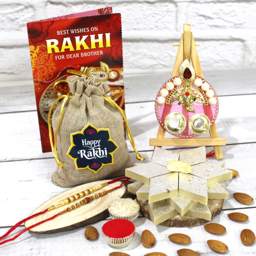 Kaju Katli & Almond Thali - Kaju Katli, Almonds in Potli, Designer Ganesha Thali with Pearls & Diamond with 2 Rakhi and Roli-Chawal