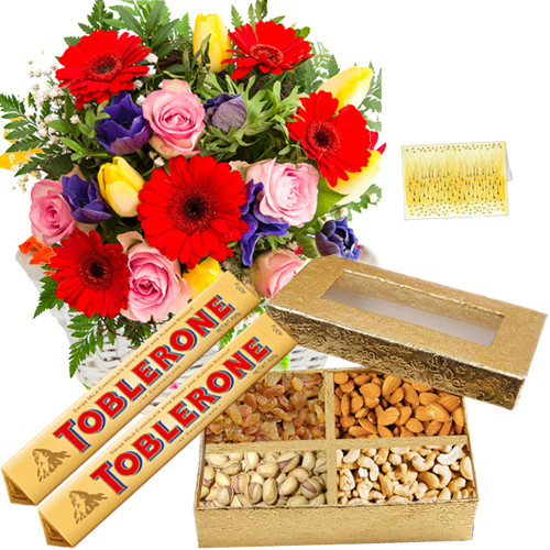 Nice Combo - 15 Mix Seasonal Flowers In Basket + 200 Gms Assorted Dryfruits Box + 2 Toblerone Chocolate Bars + Card