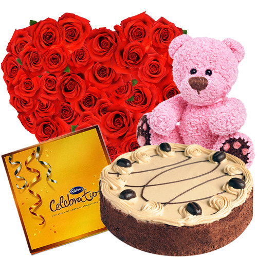 Appealing - Heart Shaped Arrangement 50 Red Roses Basket + 1/2 Kg Chocolate Cake + Cadbury Celebrations + Teddy Bear 8" + Card