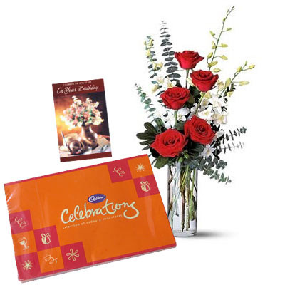 Beautiful Combination - 10 White Orchids & 6 Red Roses in Vase + Cadbury Celebration 162 gms + Card