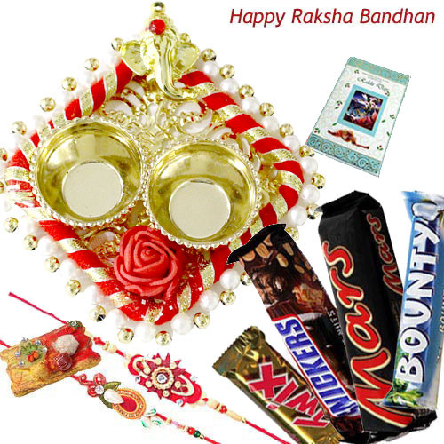 Chocolate Trip Thali - Auspicious Ganesha Thali with Pearls, Snickers, Mars, Twix, Bounty with 2 Fancy Rakhis and Roli-Chawal