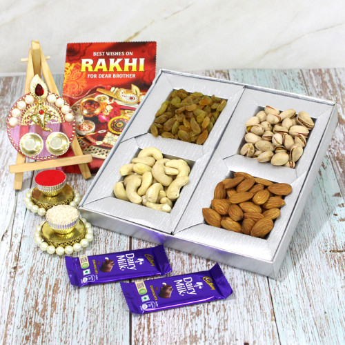 Alluring Thali - Assorted Dry Fruits 200 gms, Auspicious Ganesha Thali with Pearls with 2 Fancy Rakhis and Roli-Chawal