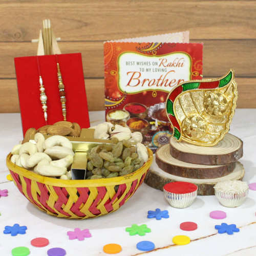 Grand Rakhi Hamper - Assorted Dry Fruits Basket 500 gms, Auspicious Golden Leaf Thali, 2 Rakhi, Free Greeting Card & Roli-Chawal