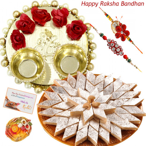 Delicious Kaju Katli Thali - Kaju Katli, Elegant Ganesh Thali with Flowers & Pearls with 2 Rakhi and Roli-Chawal