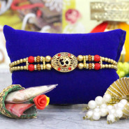Elegant OM Rakhi with Twin Threads and Pearls