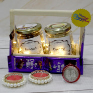 Nutty Diwali Celebration - Almond in Jar, Cashew in Jar, 8 Dairy Milk, Diwali Props, Led Light, Wooden Tray with 2 Decorative Golden Diyas and Laxmi-Ganesha Coin