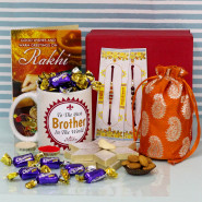 Festive Punch - Kaju Katli, Personalized To The Best Brother In The World Photo Mug, Almond in Potli (D), 20 Cadbury Choclairs Gold, Premium Gift Box (M) with 2 Rakhi and Roli-Chawal