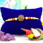 Graceful Flower Motif Rakhi with Pearls & Stones