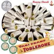 Celebration - Kaju Pista Roll 250 gms, 2 Toblerone with 4 Diyas and Laxmi-Ganesha Coin