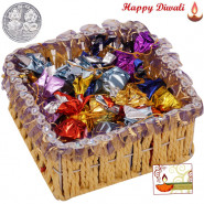 Wonderful Treat - Assorted Handmade Choclolates in Decorative Basket with Laxmi-Ganesha Coin