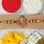 Elegant Ganesha Rakhi with Pearls and Beads