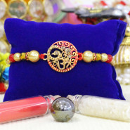 Delicate OM with Diamonds Rakhi with Pearls