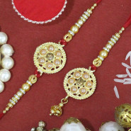 Charming Golden Hue Bhaiya Bhabhi Rakhi with Pearls & Diamonds