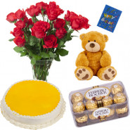 Wonderful Surprise - Pinapple Cake 1/2 kg, 12 Red Roses in Vase, 16 pcs Ferrero Rocher, Teddy 6" and card