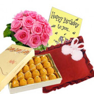 Delicate Love - Baby Pillow + Besan Ladoo 1kg + Bunch 12 Pink Roses