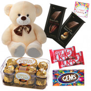 Chocolaty Teddy - Teddy 8 inch, 2 Bournville 30 gms each, Ferrero Rocher 16 pcs, 2 Kitkat, Gems & Card