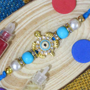 Exclusive Designer Rakhi with Golden Dial, Diamonds & Pearls