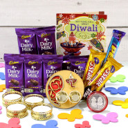 Rich Chocolaty Treat - Artistic Ganesha Thali with Golden Base, 5 Assorted Bars, 5 Dairy Milk Bars with 4 Golden Diyas and Laxmi-Ganesha Coin