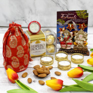 Almonds Hamper - Almonds 200 gms in Potli (D), Ferrero Rocher 16 pcs, Laxmi-ganesha Idol with 4 Golden Diyas and Laxmi-Ganesha Coin