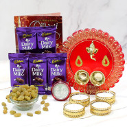 Rich Treat Thali - Raisins 200 gms in Potli (D), Designer Ganesh Thali with 4 Golden Diyas and Laxmi-Ganesha Coin