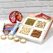 Elegant Dryfruits - Assorted Dryfruits 200 gms, Snickers, Twix, Mars, Bounty, Fancy Ganesha Thali with Flowers & Pearls with 4 Golden Diyas and Laxmi-Ganesha Coin