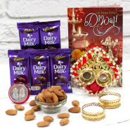 Crunchy Nuts Thali - Almonds 200 gms, 5 Dairy Milk, Auspicious Ganesha Thali with Pearls with 2 Golden Diyas and Laxmi-Ganesha Coin