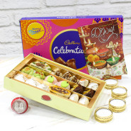 Sweetest Combo - Assorted Kaju Sweets 250 gms, Celebration with 4 Golden Diyas and Laxmi-Ganesha Coin