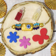 Stunning "Evil Eye" Rakhi with Golden Dial, Delicate Beads and Golden Thread