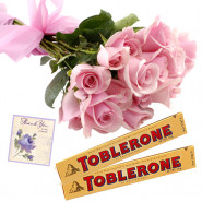 Rose N Toblerone - 10 Pink Roses Bunch, 2 Toblerone + Card