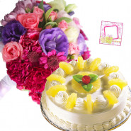 Spectacular Combo - 12 Mix seasonal Flowers, 1/2 Kg Pineapple Cake + Card
