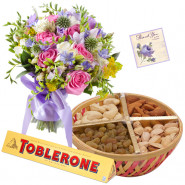 Toblerone with Love - Bunch of 12 Mix Flowers, Assorted Dryfruits in Basket 200 gms, 1 Toblerone & Card