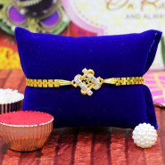 Dazzling OM Gold Plated Rakhi with Diamond