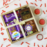 Celebrate with Chocolate - Cadbary Temptations, Dairy Milk Silk, Dairy Milk Silk Hazelnut, Dairy Milk Fruit n Nut, 2 Diwali Props, Led Light, Wooden Tray with 2 Decorative Golden Diyas and Laxmi-Ganesha Coin