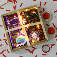 Celebrate with Chocolate - Cadbary Temptations, Dairy Milk Silk, Dairy Milk Silk Hazelnut, Dairy Milk Fruit n Nut, 2 Diwali Props, Led Light, Wooden Tray with 2 Decorative Golden Diyas and Laxmi-Ganesha Coin