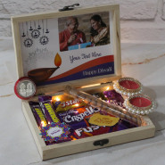 Tasty Diwali Box - Almond in Glass Tube, Dairy Milk Crispello, Dairy Milk Fuse, Dairy Milk, Fivestar, 2 Munch, 2 Diwali Props, Led Light, Personalized Wooden Box with 2 Decorative Golden Diyas and Laxmi-Ganesha Coin