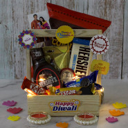 Perfect Diwali Basket - Hershey's Cookies & Cream  Bar, Hershey's Kisses Milk Chocolate, Cornitos Chips, Hershey's Chocolate Syrup, Oreo, Fivestar, Kit Kat, 6 Diwali Props, Led Light, Wooden Basket with 2 Decorative Golden Diyas and Laxmi-Ganesha Coin